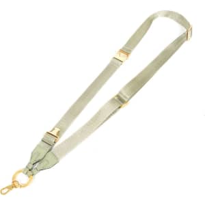 An adjustable phone neck lanyard in a light olive green colour with gold hardware detailing.