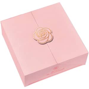 A pink gift box with a gold rose design, perfect for a custom wedding gift.