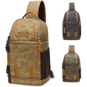 A waterproof sling camera backpack in tan, grey, and dark green with tan accents and branded logo.