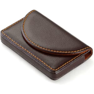 A brown business card holder case with contrasting orange stitching and a curved flap closure. Features a logo.