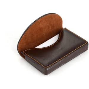A brown leather business card holder case with a suede interior and curved top for easy access.