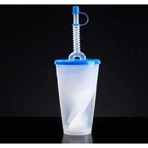 A drink cup in clear plastic with a blue lid and straw, featuring a coiled straw design.