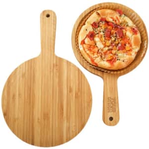 A round solid bamboo pizza tray with a smooth surface and a handle, featuring a pizza on top.