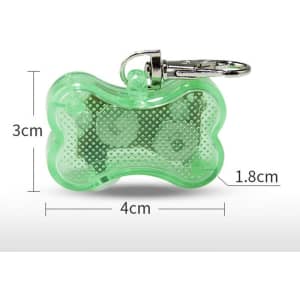A green LED clip-on pet safety light in a bone shape, featuring a metal attachment clip. Dimensions are 4cm x 3cm x 1.8cm.