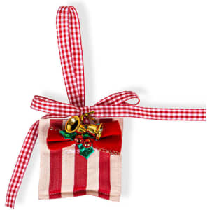 A red and beige striped sachet decorated with a bow and miniature brass instruments. It has a checkered ribbon for hanging.