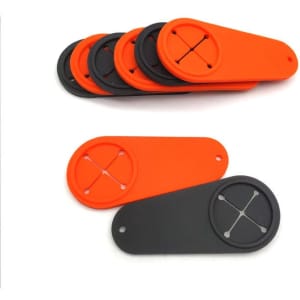 A set of golf towel holders in orange and black, featuring circular attachments for securing towels.