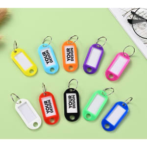 A variety of custom key tags in bright colours, with a tang ring and spaces for personal designs.