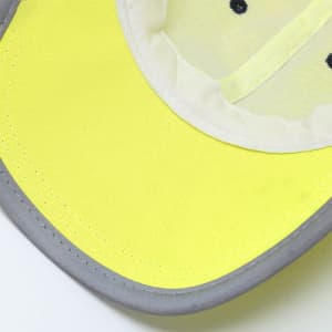 A high visibility reflective baseball cap with a bright yellow front and grey brim. It features a logo on the interior.