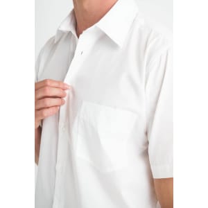 A white short sleeve button-up shirt featuring a chest pocket and a collar. The shirt has a subtle branding logo.