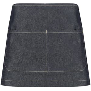 A dark denim short waist apron featuring a front pocket and contrasting stitching. Includes a logo.