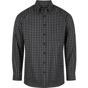 A men's long sleeve button-up shirt featuring a black and grey checkered pattern and a pocket on the chest.