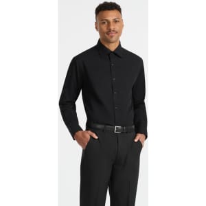 A black long sleeve button-up shirt on a model, featuring a sleek design and a belt.