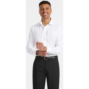 A white long sleeve button-up shirt displayed on a model wearing black trousers and a belt. The shirt features a logo.