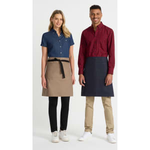 A ladies short sleeve shirt in denim blue, styled with a button-up design, displayed alongside a checkered red shirt.