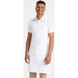 A white bib apron worn by a smiling male model, featuring an adjustable neck strap and a front pocket.