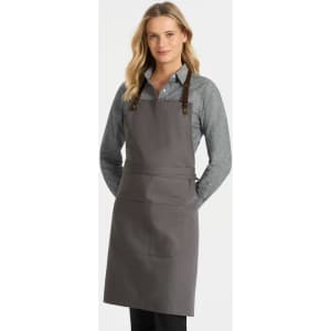 A ladies' long sleeve button-up shirt in grey, featuring a classic collar and paired with a grey apron.