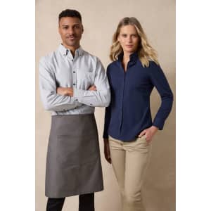 A long sleeve button-up shirt in grey and navy, displayed on a male and female model. Both models have logo branding.