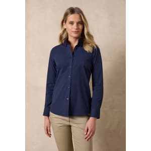 A navy blue ladies long sleeve button-up shirt with a fitted design. The model stands against a neutral background.