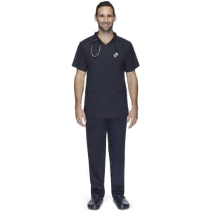 A man wearing navy unisex scrubs pants and a matching top, with a stethoscope around his neck.