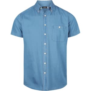 A light blue men's short sleeve button-up shirt with a front pocket and a logo on the collar.