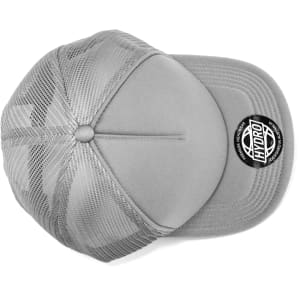 A grey cap with a rounded top and mesh back, featuring a circular logo on the front panel.