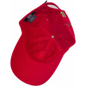 A red cap featuring a logo, with an open interior view showcasing its lining and inner structure.