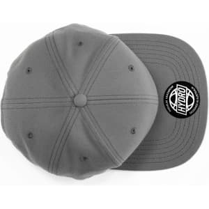 A grey cap with a flat brim and a round top, featuring a logo on the side.