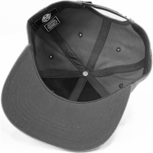 A black cap with a flat brim and an interior view showcasing its structured crown and six ventilation eyelets.