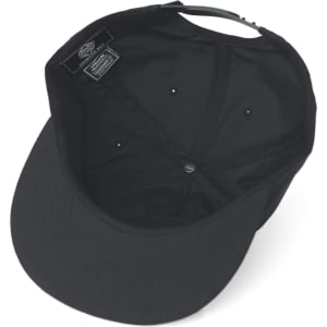 A black cap featuring a neat interior design and ventilation holes, with a branding label inside.