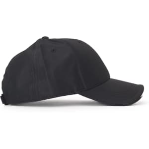 A black cap with a curved brim, featuring a logo on the side and ventilation holes.