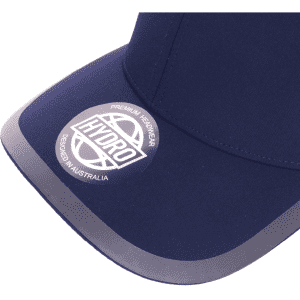 A navy cap featuring a curved peak and a logo on the front, designed for headwear.