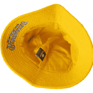 A yellow terry bucket hat with a branded label inside. The interior is fully lined.
