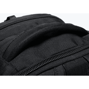 A black backpack featuring a sturdy handle and zippers. It is designed for durability and functionality.