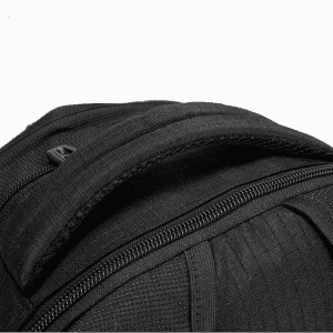 A black Fitzroy Backpack featuring a textured fabric and a sturdy top handle. It has a zippered compartment.