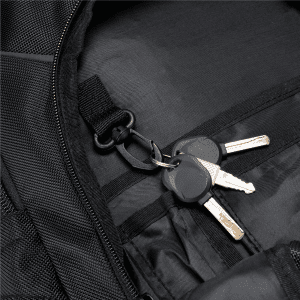 A black backpack interior featuring a hook and a set of keys attached inside.