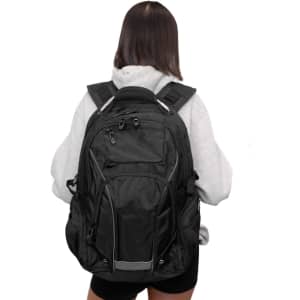 A black Eiger Backpack is being worn, featuring multiple compartments and a shoulder strap design.