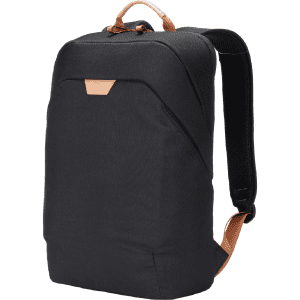 A black backpack with a leather accent, featuring padded shoulder straps and a logo on the front.