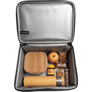 A cooler bag containing a drink bottle, lunch box, apple, and snacks, with a silver interior and a branding logo.
