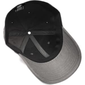 A black and grey cap featuring a brand logo, viewed from above, showcasing its interior design.