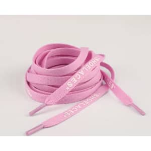 A bundle of pink printed shoelaces with text on the ends, displayed on a light background.