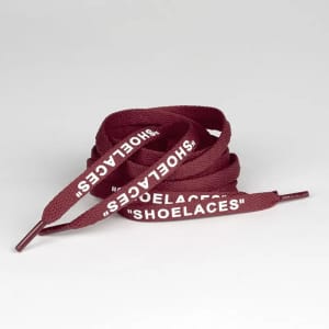 Burgundy printed shoelaces with white text, featuring a branding logo.