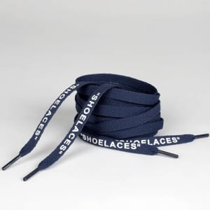 Navy printed shoelaces arranged in a coiled manner, featuring a logo on the ends.