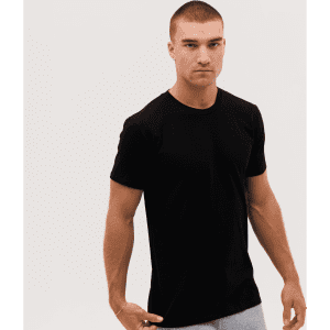 A black T-shirt displayed on a male model with a neutral background. The shirt has a logo on the front.