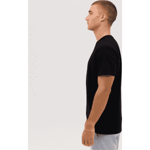 A black T-shirt displayed from the side, featuring a simple design and a logo on the shirt.