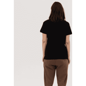 A black women's polo shirt is displayed from the back, featuring a simple design and a relaxed fit.
