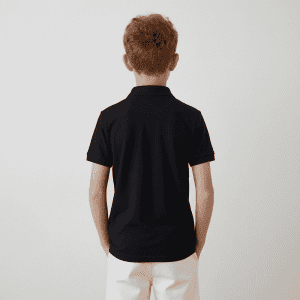 A black youth polo shirt viewed from the back. The shirt features short sleeves and a collar.