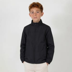 A youth weather jacket in black, featuring a zip front and a stand-up collar. The model has curly, reddish-brown hair.