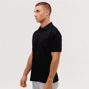 A black polo shirt displayed on a model, featuring a collar and short sleeves. It includes a logo on the chest.