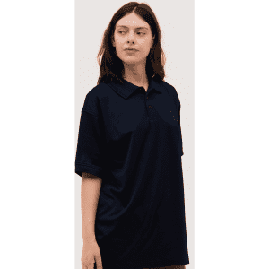 A navy blue polo shirt with a relaxed fit, featuring a collar and buttons, modelled by a person.