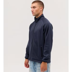 A navy Summit Bonded Jacket worn by a model, featuring a zip front and side pockets. The jacket includes a logo.